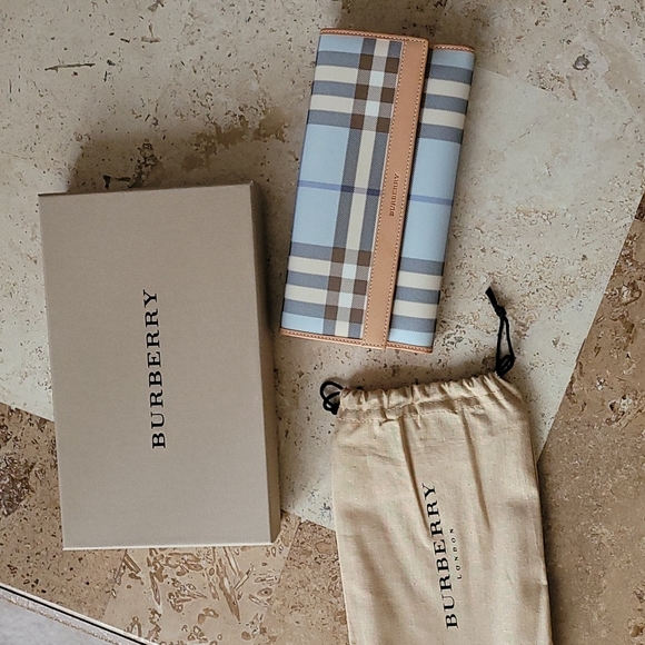 Burberry Handbags - BURBERRY light blue Nova Check PVC and leather wallet.